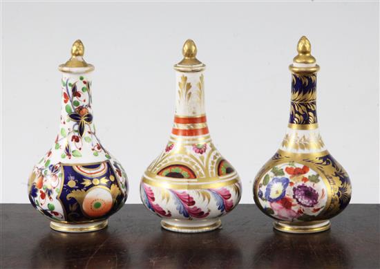 Three Derby porcelain scent bottles and stoppers, early 19th century, 10.5 - 11cm